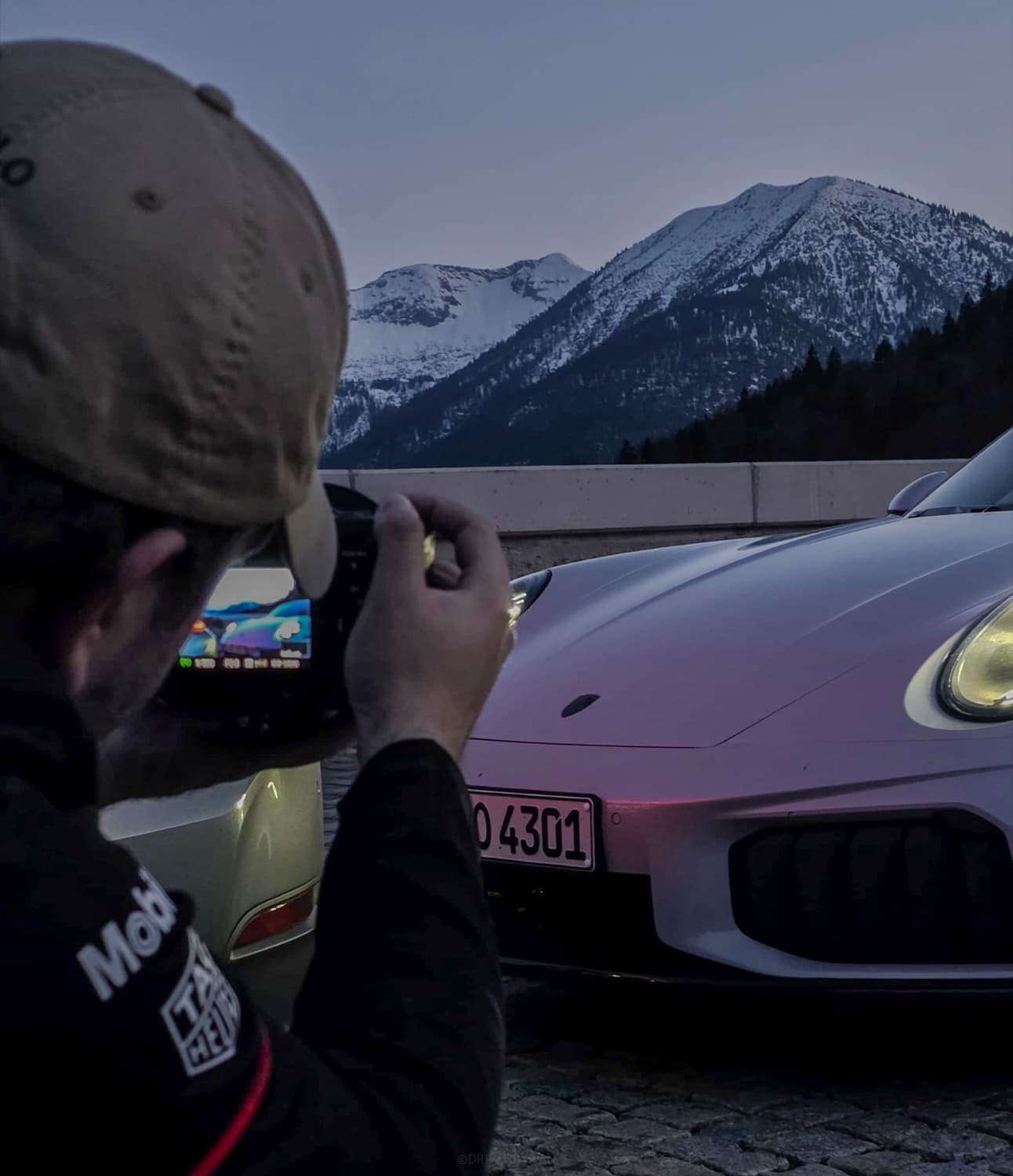 Ivan photographing a Porsche in the mountains.
